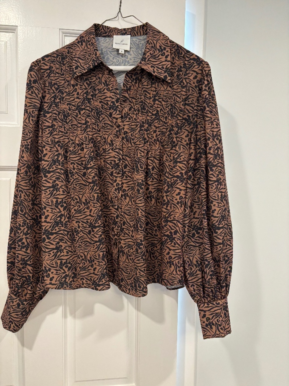 Black and brown button down top